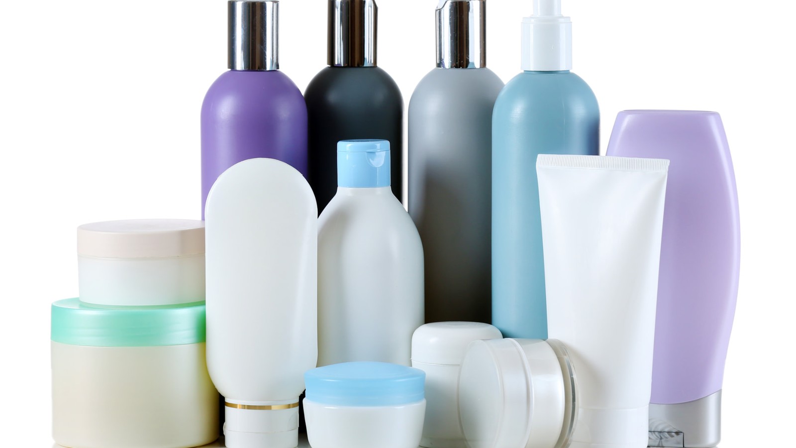 Range of unbranded cosmetic and personal care bottles of different formats and materials